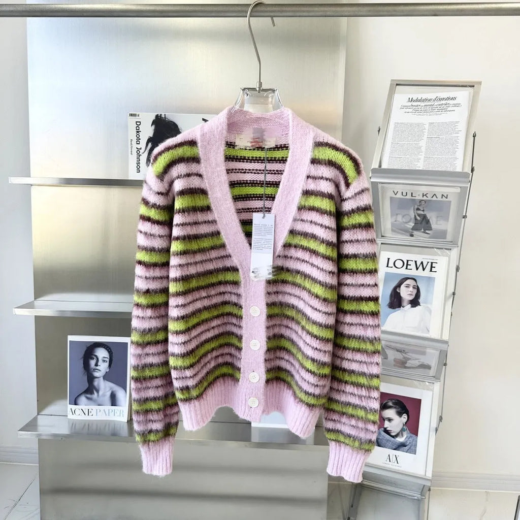 Pink wool knitted women's cardigan showing both round-neck pullover and open cardigan styles