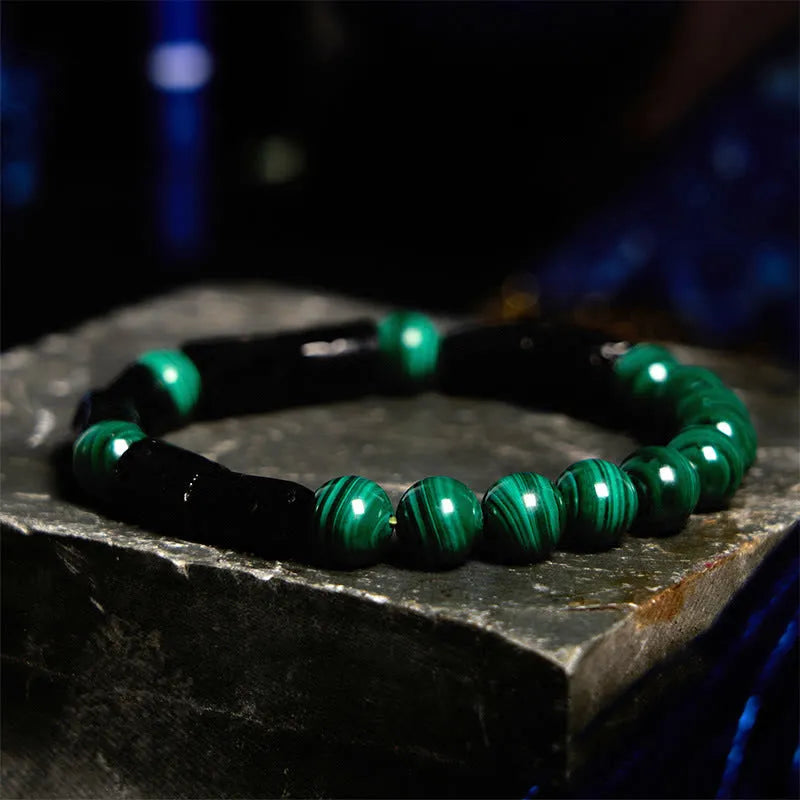 Natural obsidian single bead bracelet with 8mm diameter stone and retro constellation detailing on metal components