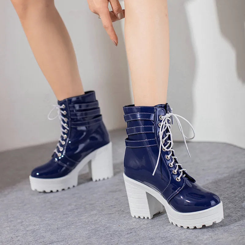 Women's black thick heel ankle boots with lace-up front and round toe on waterproof platform sole