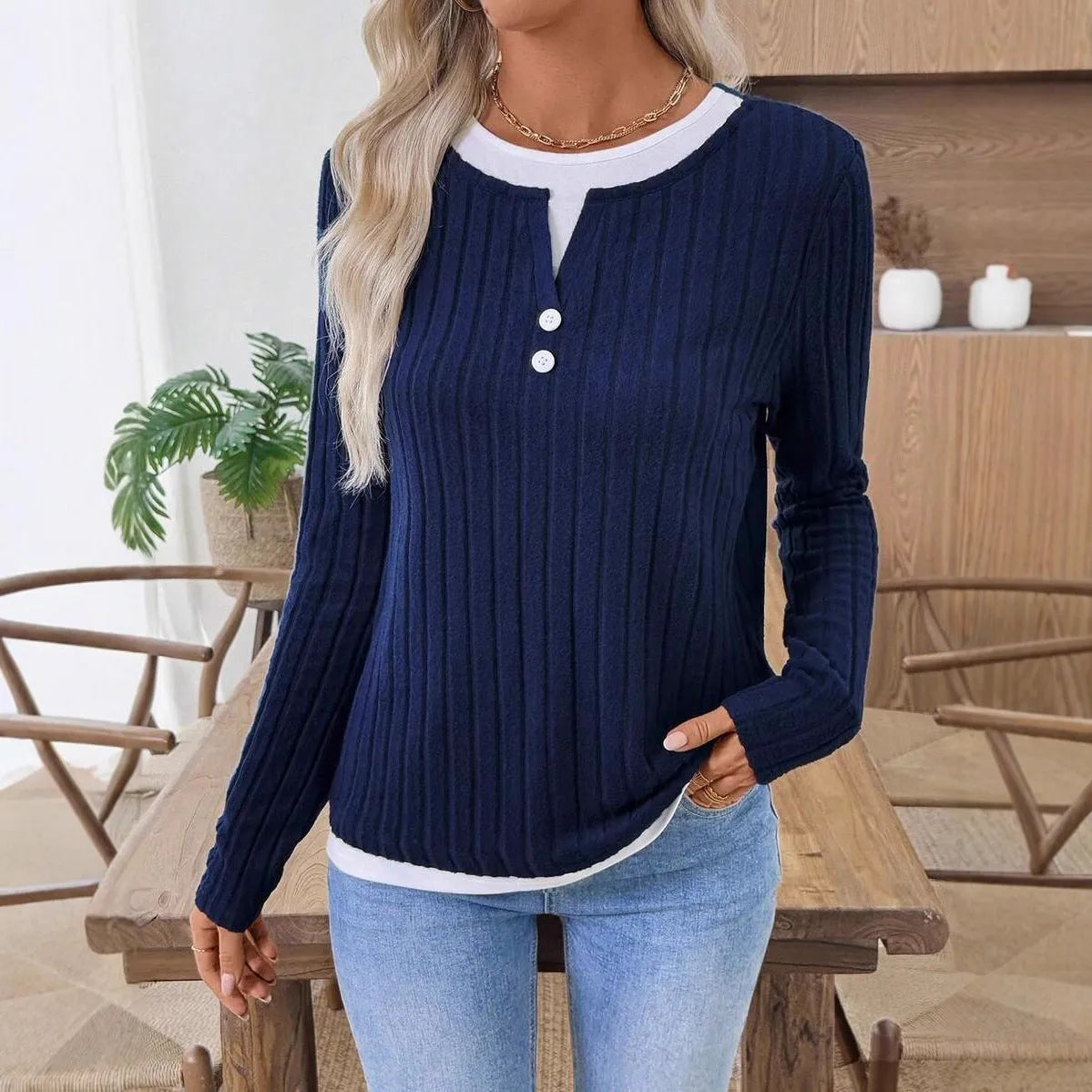 Women's fake two-piece pullover sweater with round neck and button detail in concave stripe polyester