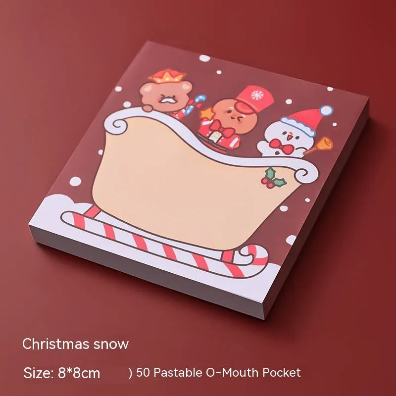 Christmas sticky notes pad with festive designs including elf, gift, sled, Santa Claus, bear, and snowman