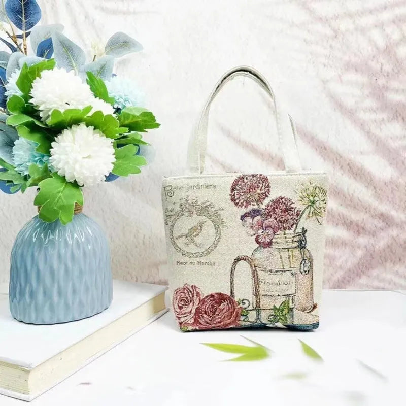 Double-sided gold wire embroidered canvas tote bag showing Bunny design with reinforced base