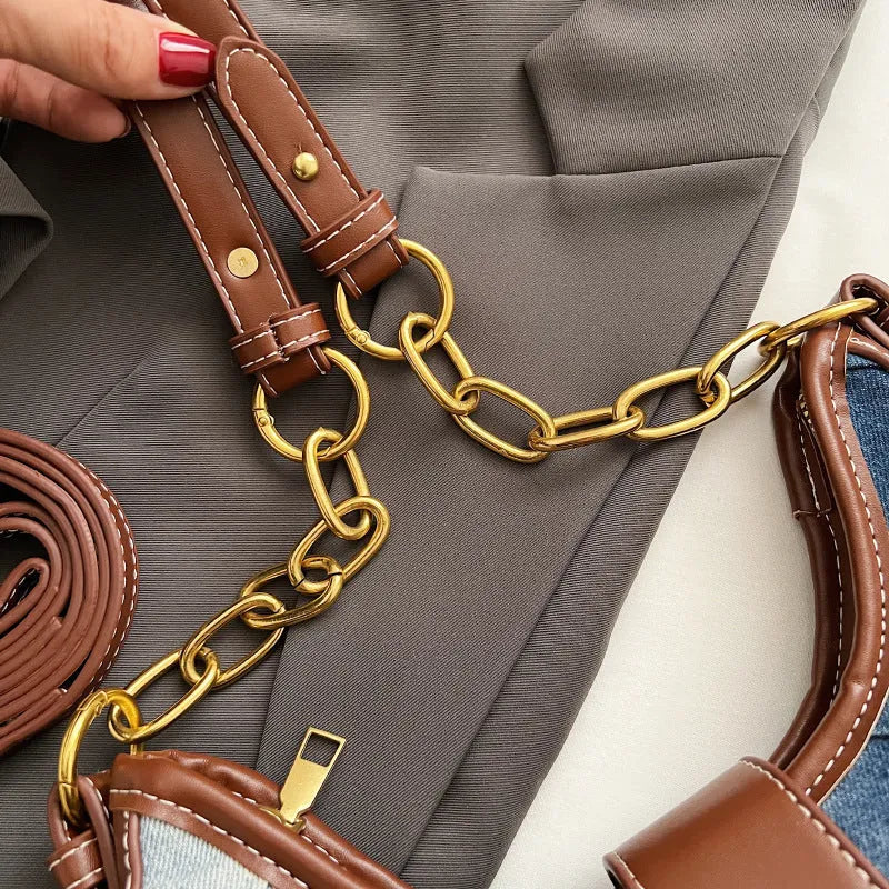 Women's brown denim shoulder bag with diamond chain accents and bucket shape design