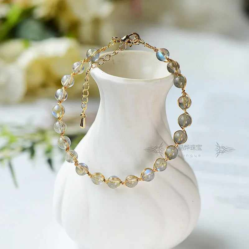 14K gold-plated women's bracelet with 6mm blue moonstone beads and metal starry sky accents