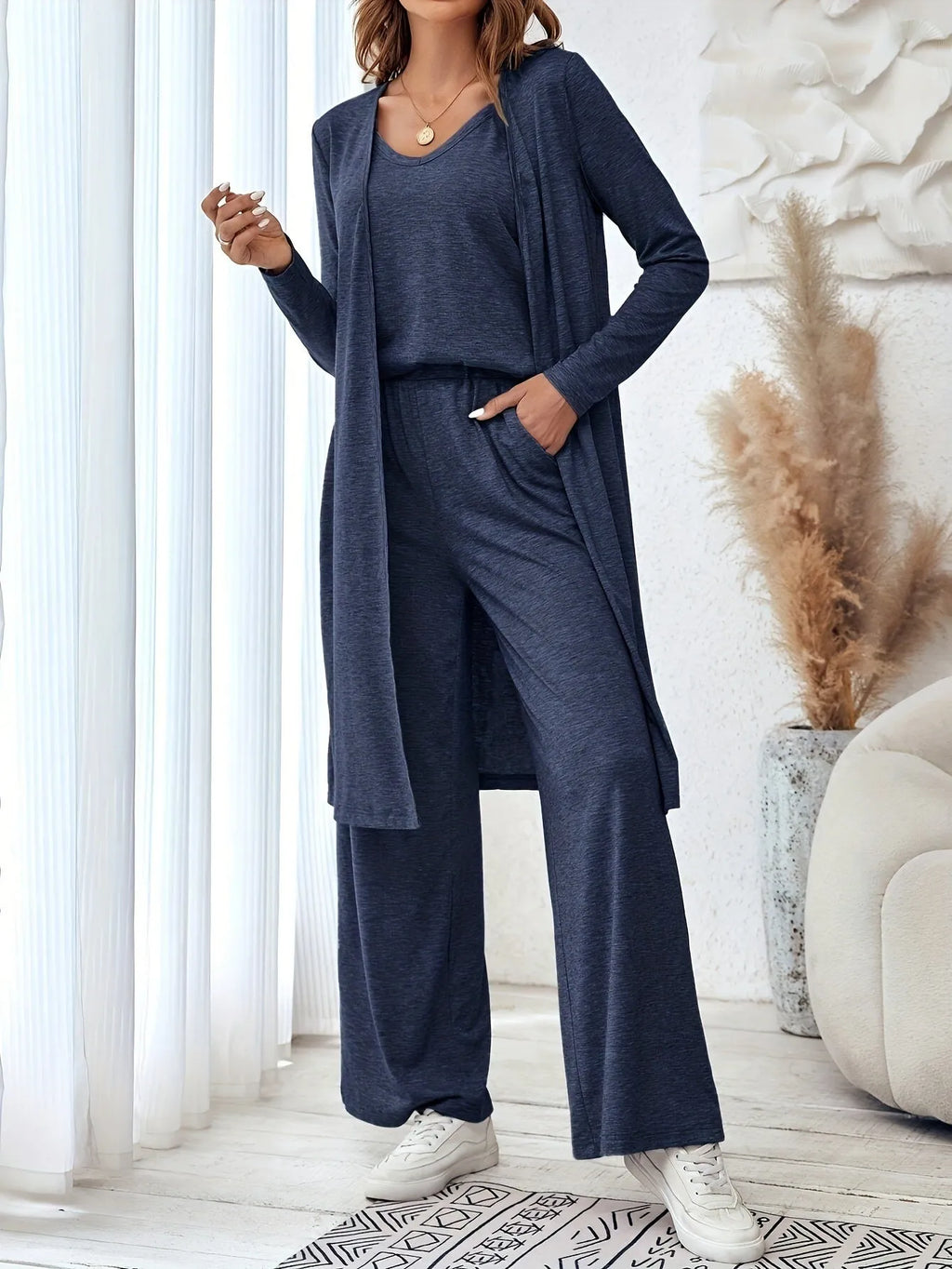 Blue women's three-piece casual suit with sling top, cardigan, and trousers in Japanese Korean style