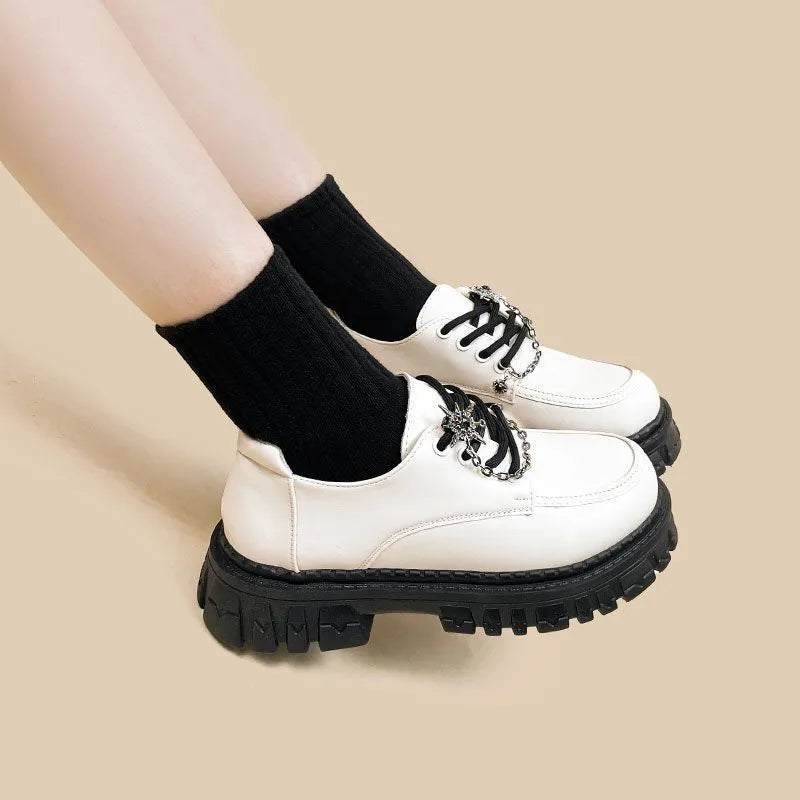 Women's preppy college loafers in Duke Asterism colour with cross-strap and round toe design