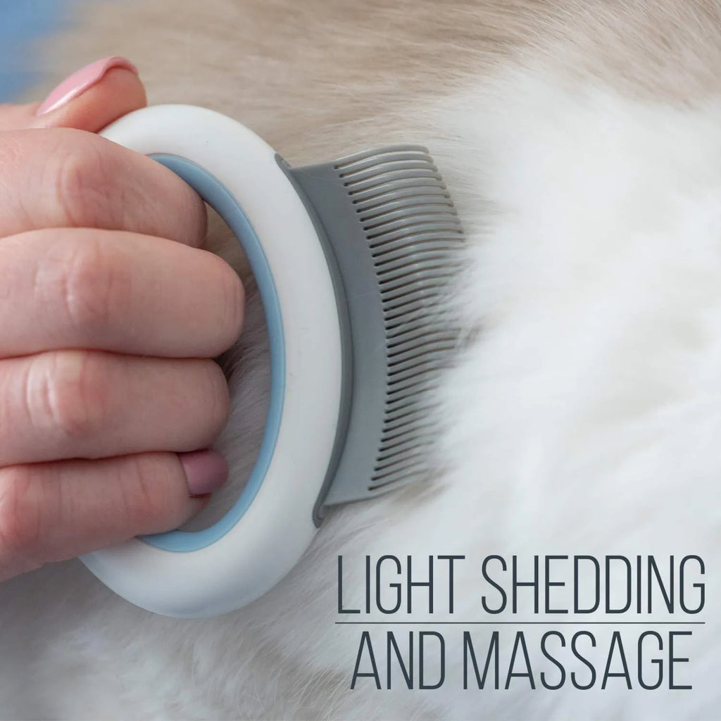 Blue pet grooming comb with ergonomic handle for deshedding cats and dogs