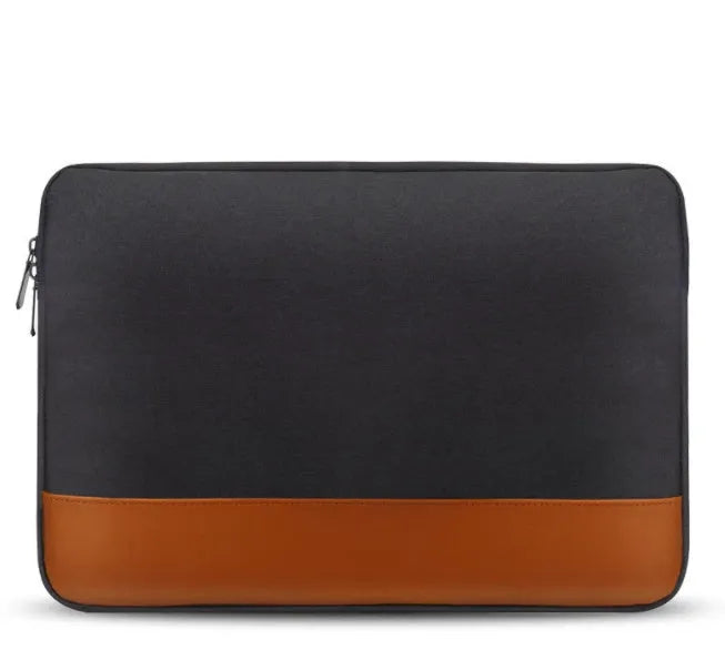13-inch Oxford cloth tablet PC liner bag in grey with zip closure on a flat surface