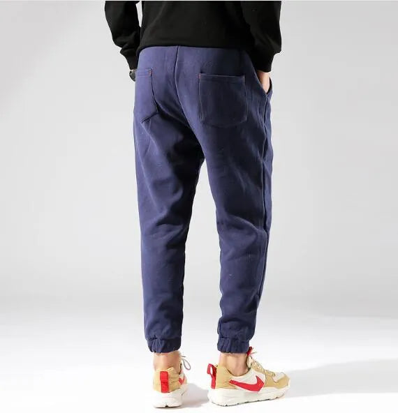 Irukite men's high waist loose winter trousers in black with belt and zip fly, plus velvet lined