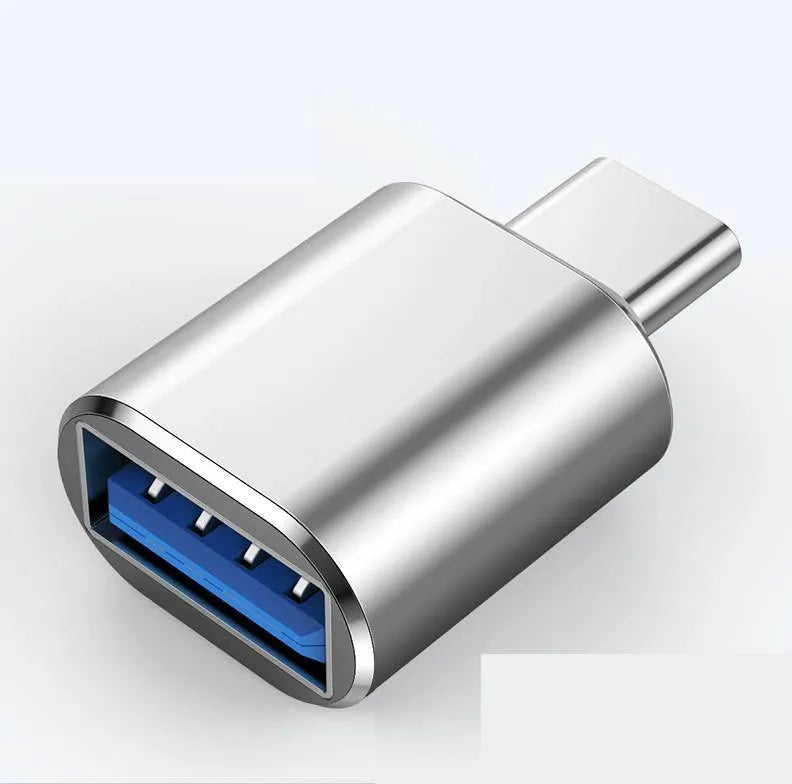 USB-C to USB-A OTG adapter shown in black, gold, and silver colour options.