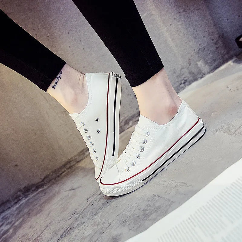 Women's casual canvas shoes in solid black, white-black, or white-red colour options