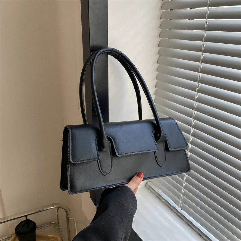 Women's horizontal square shoulder bag in PU leather with decorative stitching and single strap