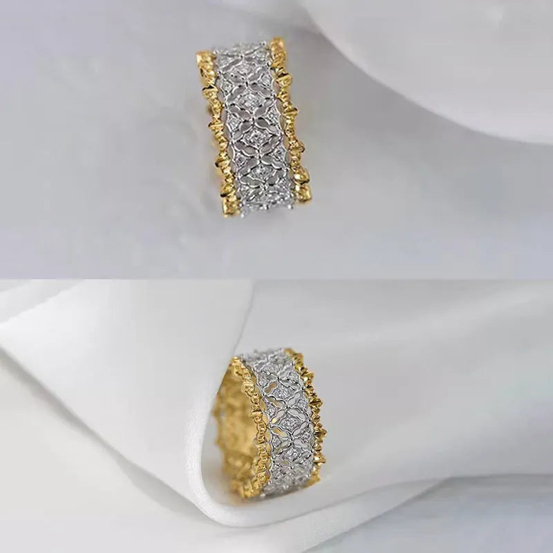 A geometric two-tone zircon ring with a gold-colour electroplated copper finish and round details.
