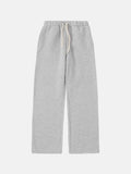 Men's black fleece-lined loose fit sweatpants with an elastic drawstring waistband.