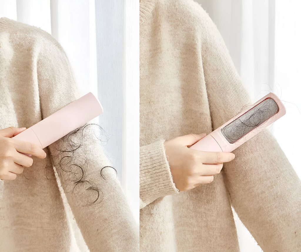 Rotating cylinder electrostatic pet hair removal brush in light pink with ABS body on a white background
