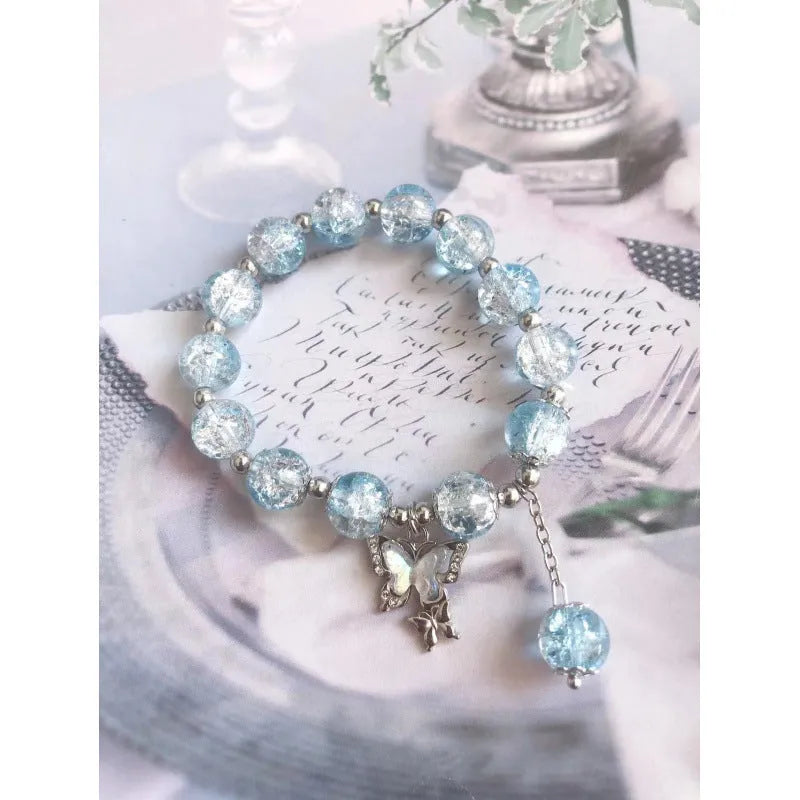 Chinese style glass bracelet with bamboo joint details in a red Lvzhu Duobao design.