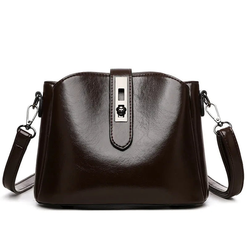 Retro women's messenger bag in PU material with medium hardness and sandwich pocket, available in white black brown