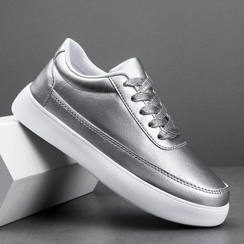 Women's white leather lace-up casual flat shoes on a solid background.