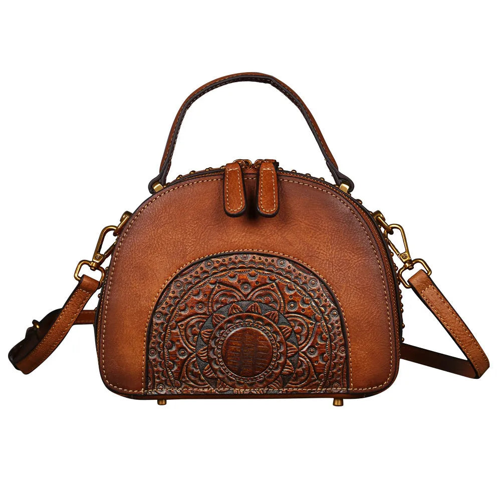Vintage-style suede cowhide leather handbag with multiple internal organisation pockets.