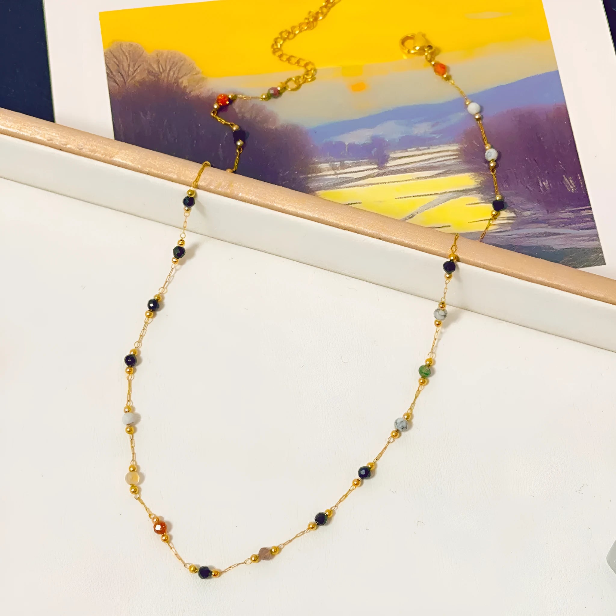 Gold titanium steel women's necklace with natural stone pendant and O-ring chain in retro simple style