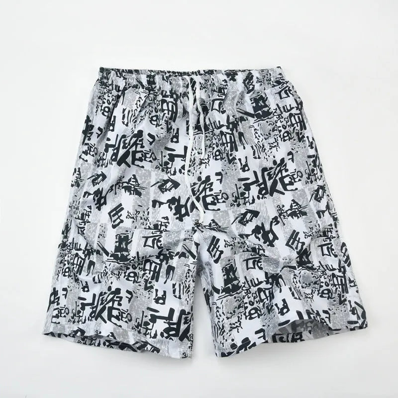 Men's floral print five-point swimming trunks in polyester fabric, free size