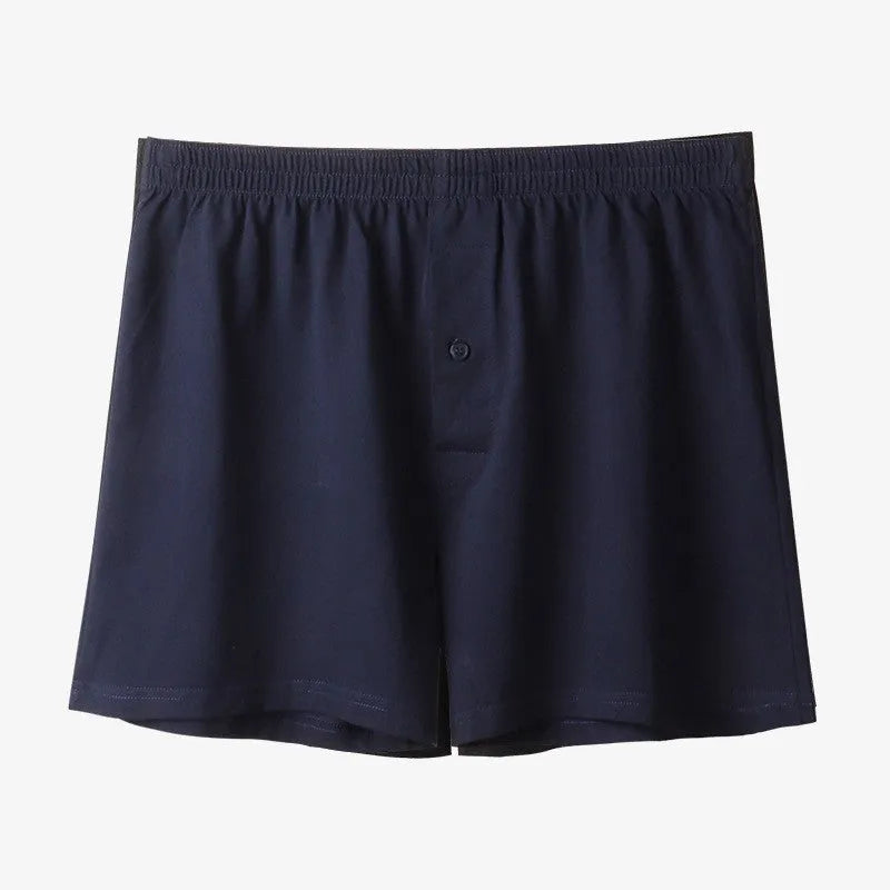 Men's light grey cotton boxer shorts with high waist and loose fit design