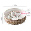 Blue ceramic slow feeder dog bowl with raised ridges for medium and large dogs on non-slip base