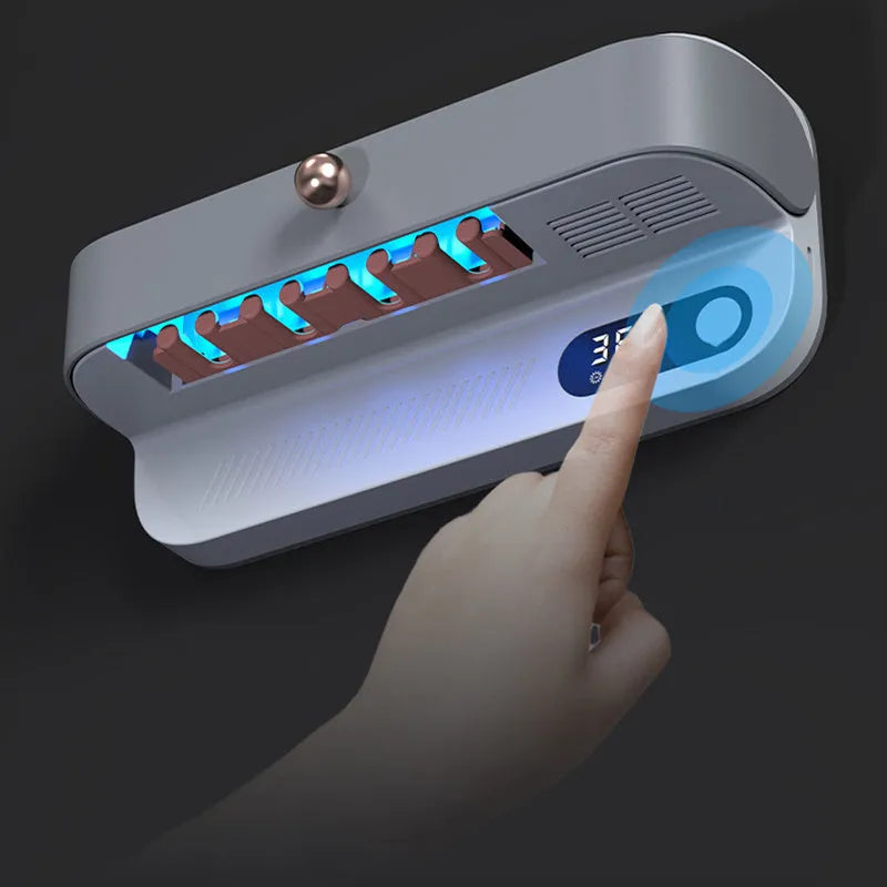 White wall-mounted smart UV toothbrush steriliser holder with USB port and button.