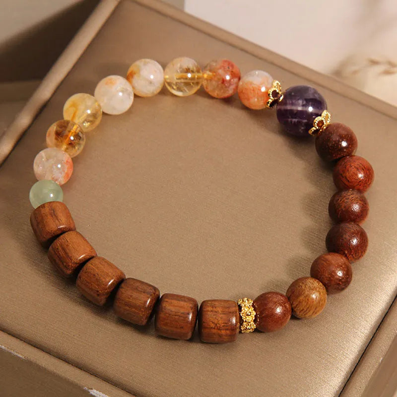 Women's bracelet with yellow tower crystal, ebony amethyst beads, pearls and rhinestones