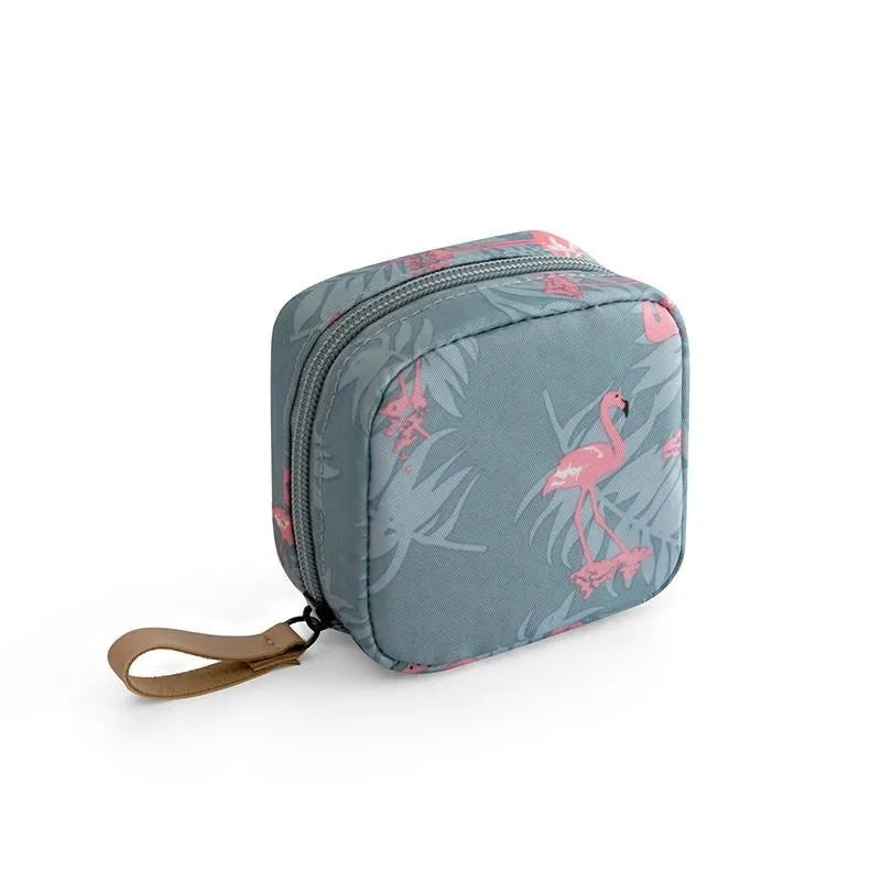 Cloth fabric cube-shaped makeup storage bag in blue, pink, white, and pink/white colour options.