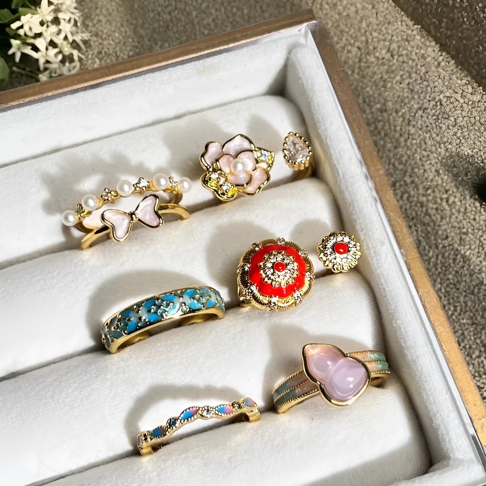 Adjustable gourd vintage ring with oil dripping finish in New Chinese style showing bow-shaped elements and zircon details