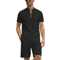Man wearing a solid colour polo shirt and matching trousers from a two-piece set in beaded bird's eye polyester fabric.