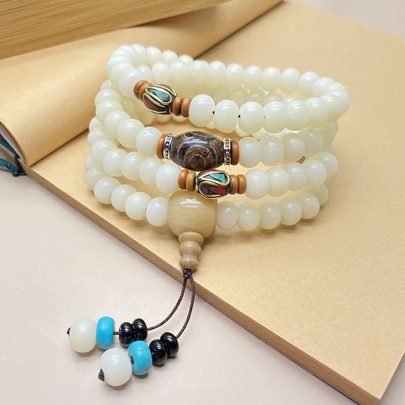 White Jade Bodhi 108-bead bracelet showing bead detail, available in three styles and sizes.