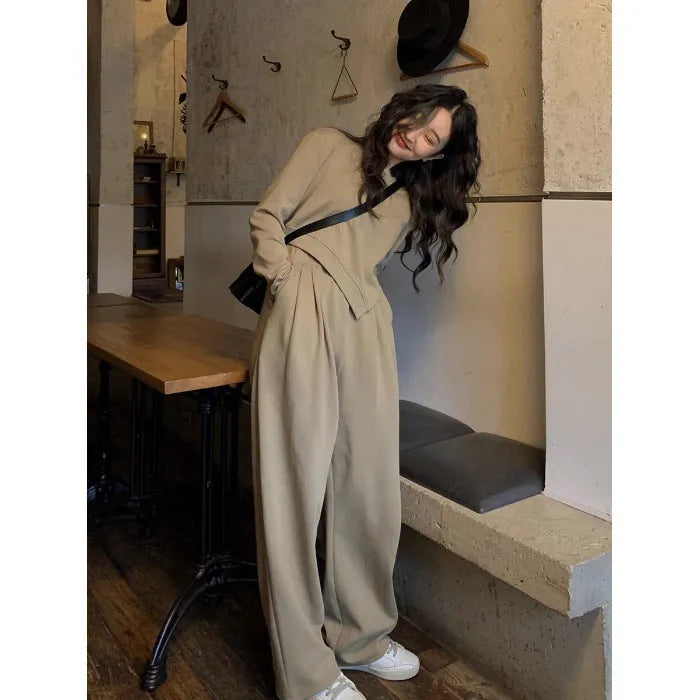 Women's khaki coloured loose-fitting sports suit with long sleeve top and full length trousers