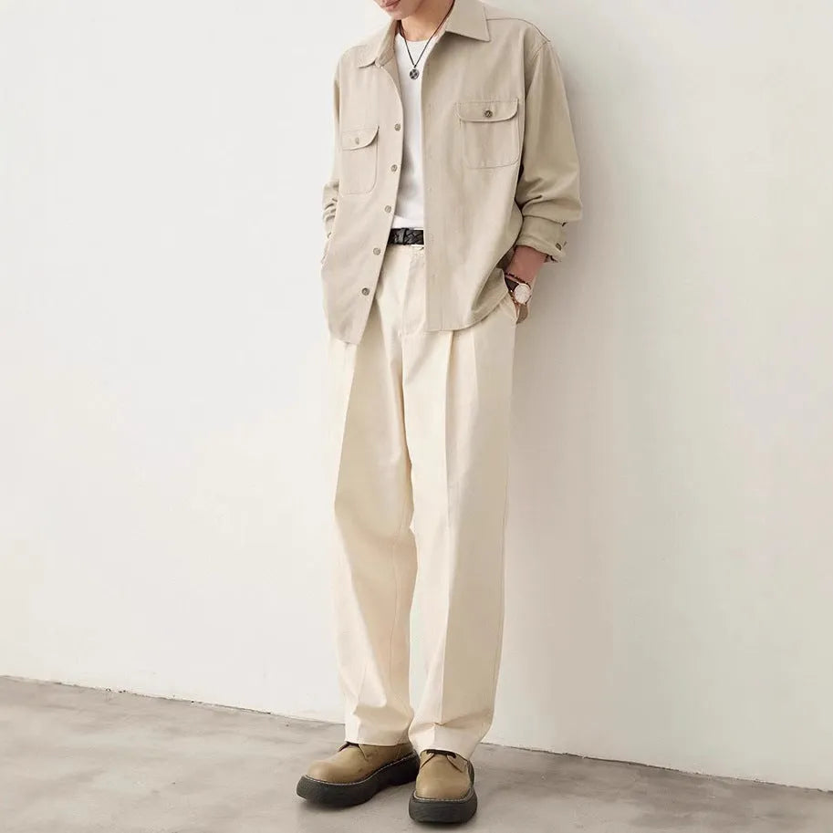 Men's long sleeve lapel shirt in light sand rice colour, showing collar detail and stitching.