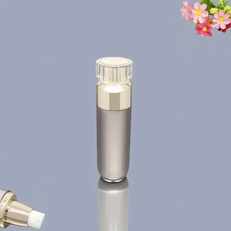 Acrylic cosmetics sub-bottling box with champagne gold and brushed white empty bottles in various sizes