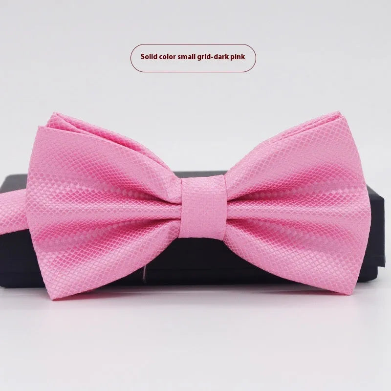 Solid colour polyester bow tie with flat head design measuring 12cm by 6cm
