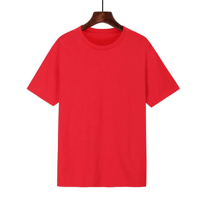 A man's loose-fitting black cotton t-shirt with short sleeves laid flat.