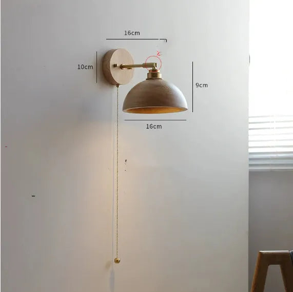 Nordic style wooden wall-mounted lamp with plug, shown in walnut colour finish.