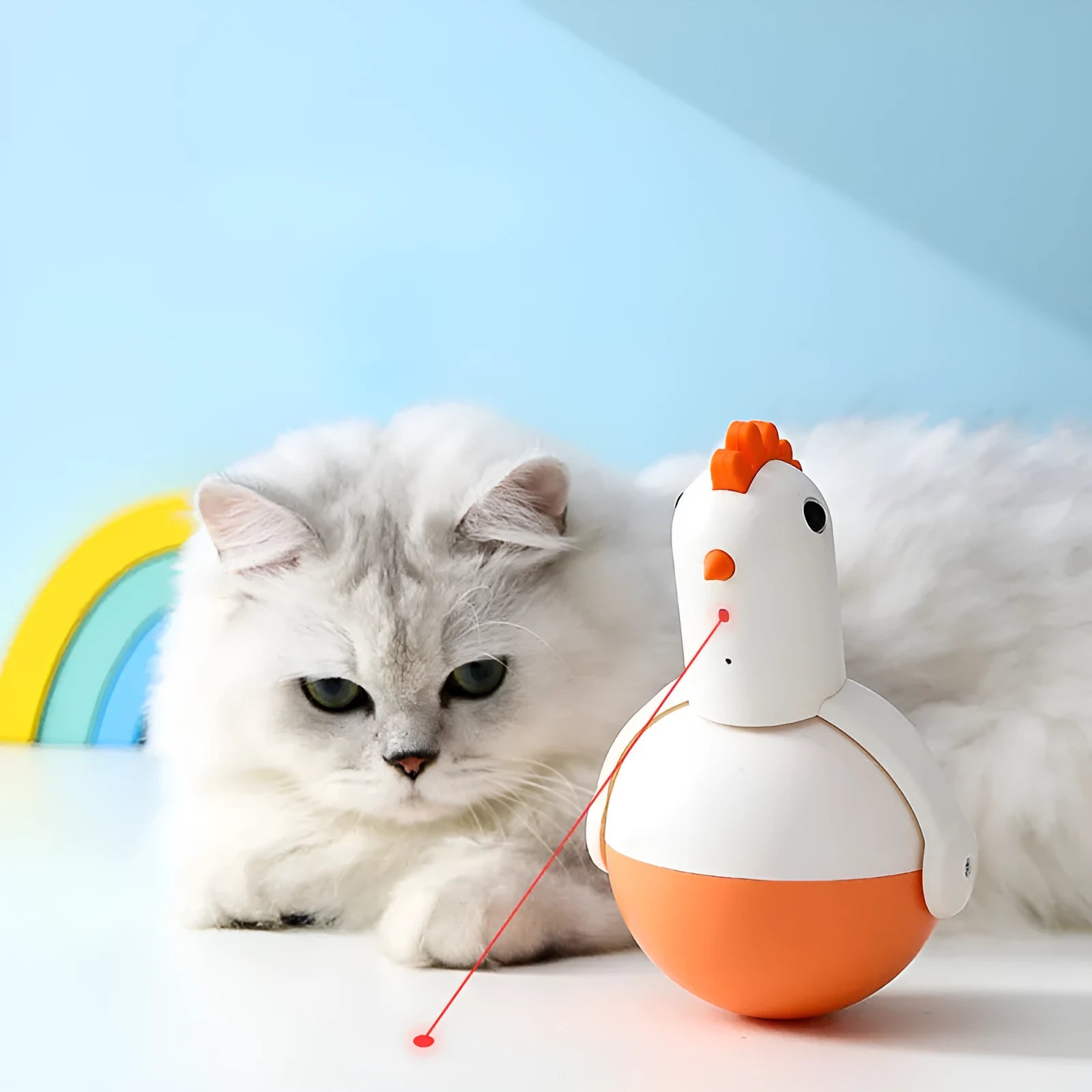 Green or orange electric cat toy chicken with laser and sound features on flat surface