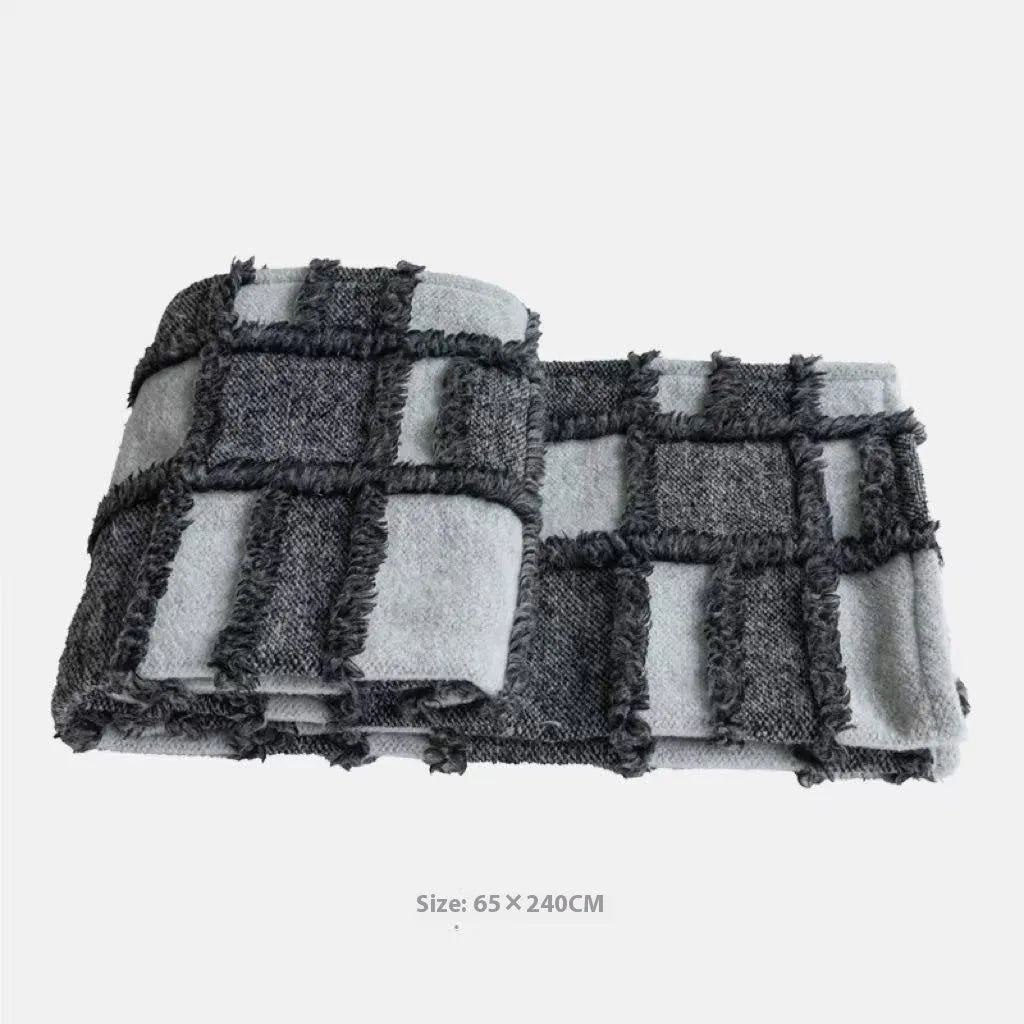 Grey and white plaid polyester bed runner blanket set with pillow on a 1.5m bed