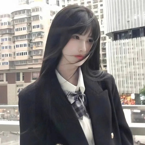 Black long straight synthetic wig with full bang fringe on mannequin head, showing brown-black colour option