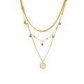 Gold-plated multi-layer stainless steel necklace with geometric tree pendant on woman