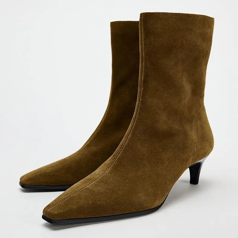 Brown square toe mid-calf boots with a side zipper and pointed stiletto kitten heel on a white background.