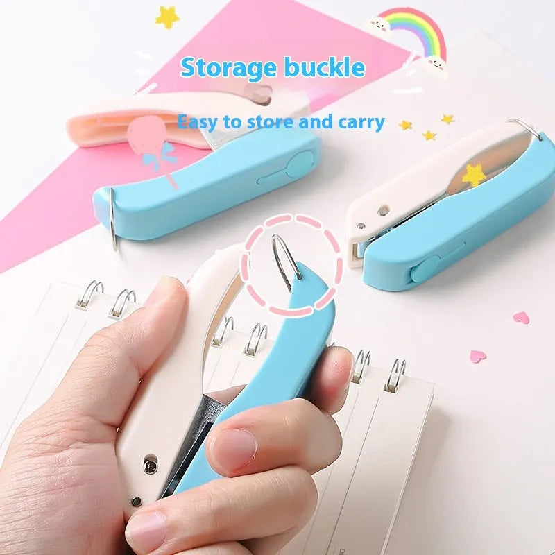Small manual kindergarten pattern punching machine with four shaped punches for classroom crafts