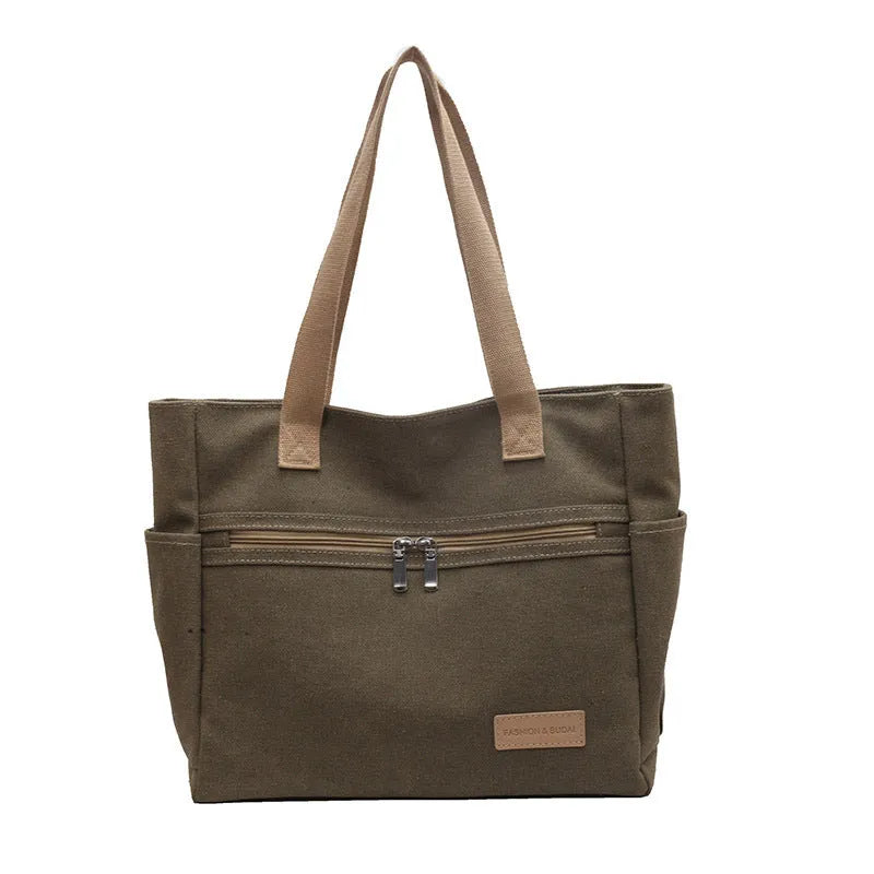Canvas shoulder bag for women with contrast stitching and double shoulder straps, available in grey
