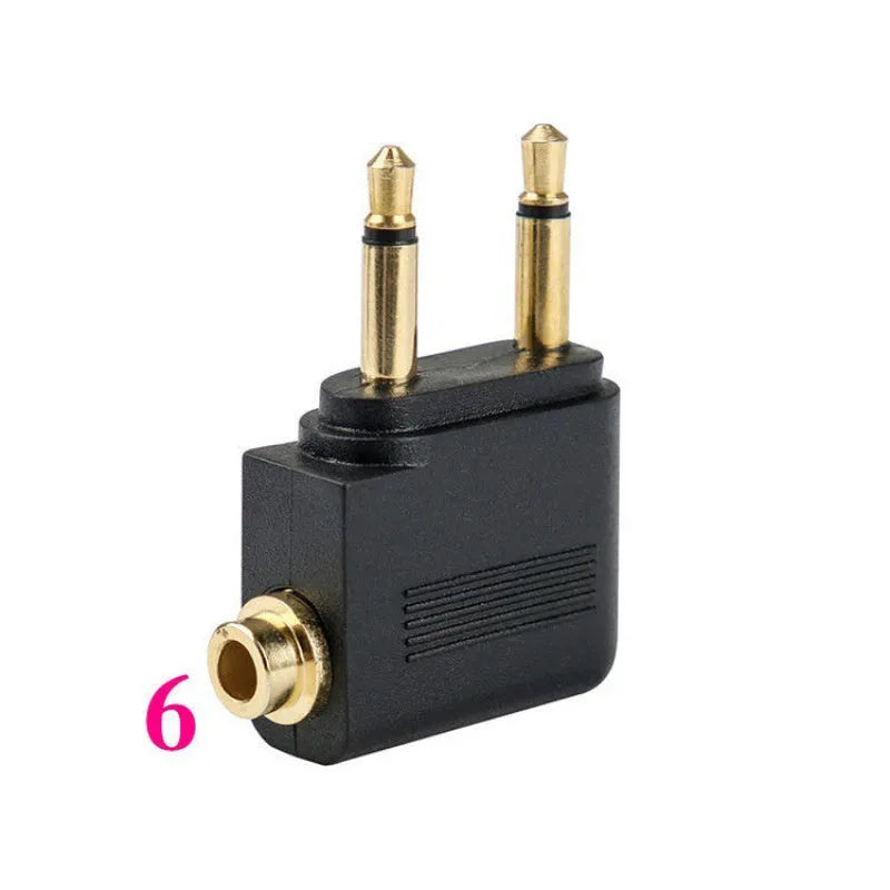 Small black Bluetooth audio adapter with a 3.5mm plug for wireless music streaming.