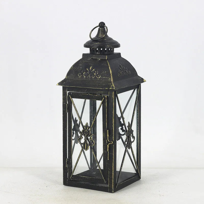 Black and white gold wrought iron storm lantern with tempered glass in three sizes for courtyard decoration.