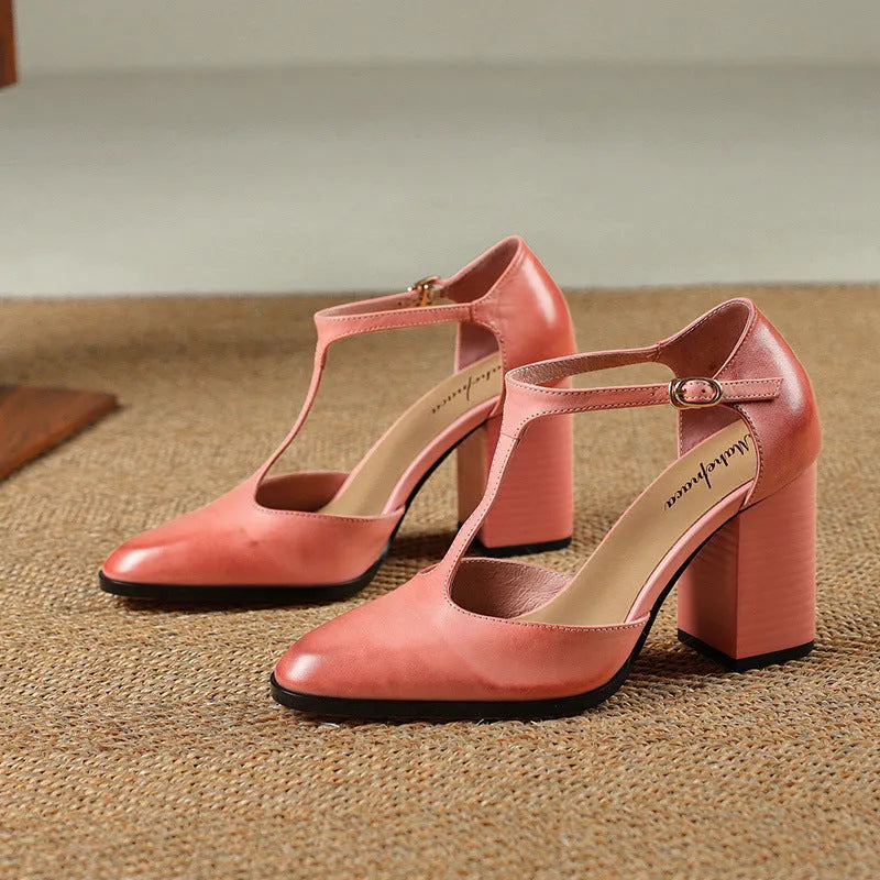 Women's pink retro Mary Jane shoes with a pointed toe, buckle strap, and cowhide leather upper.