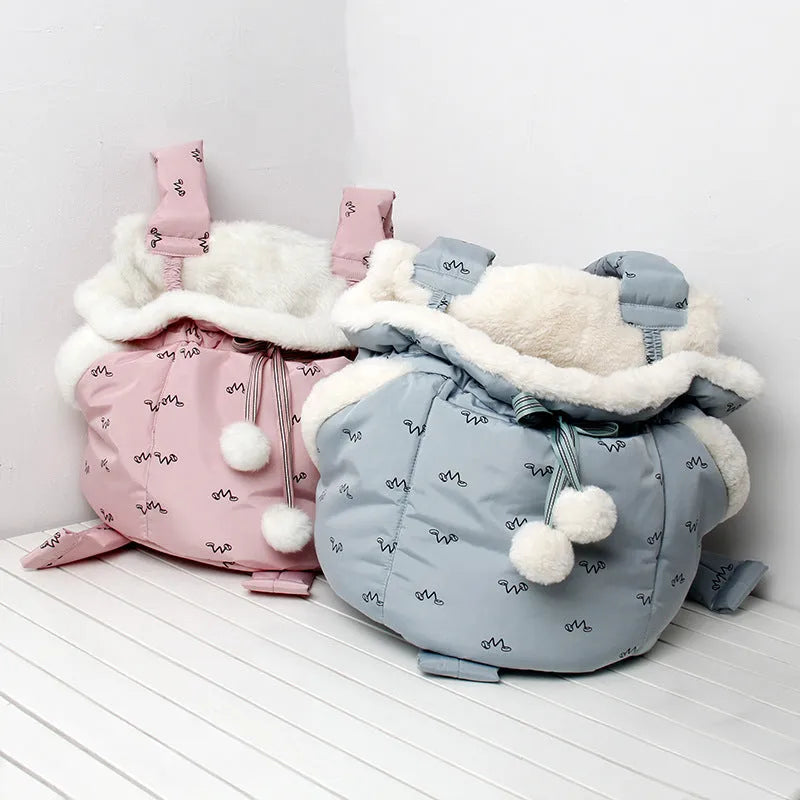 Blue winter pet carrier backpack made of plush flannel for outdoor travel with small cats and dogs